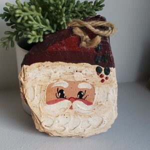 Red and White Christmas Ornament featuring Santa Claus